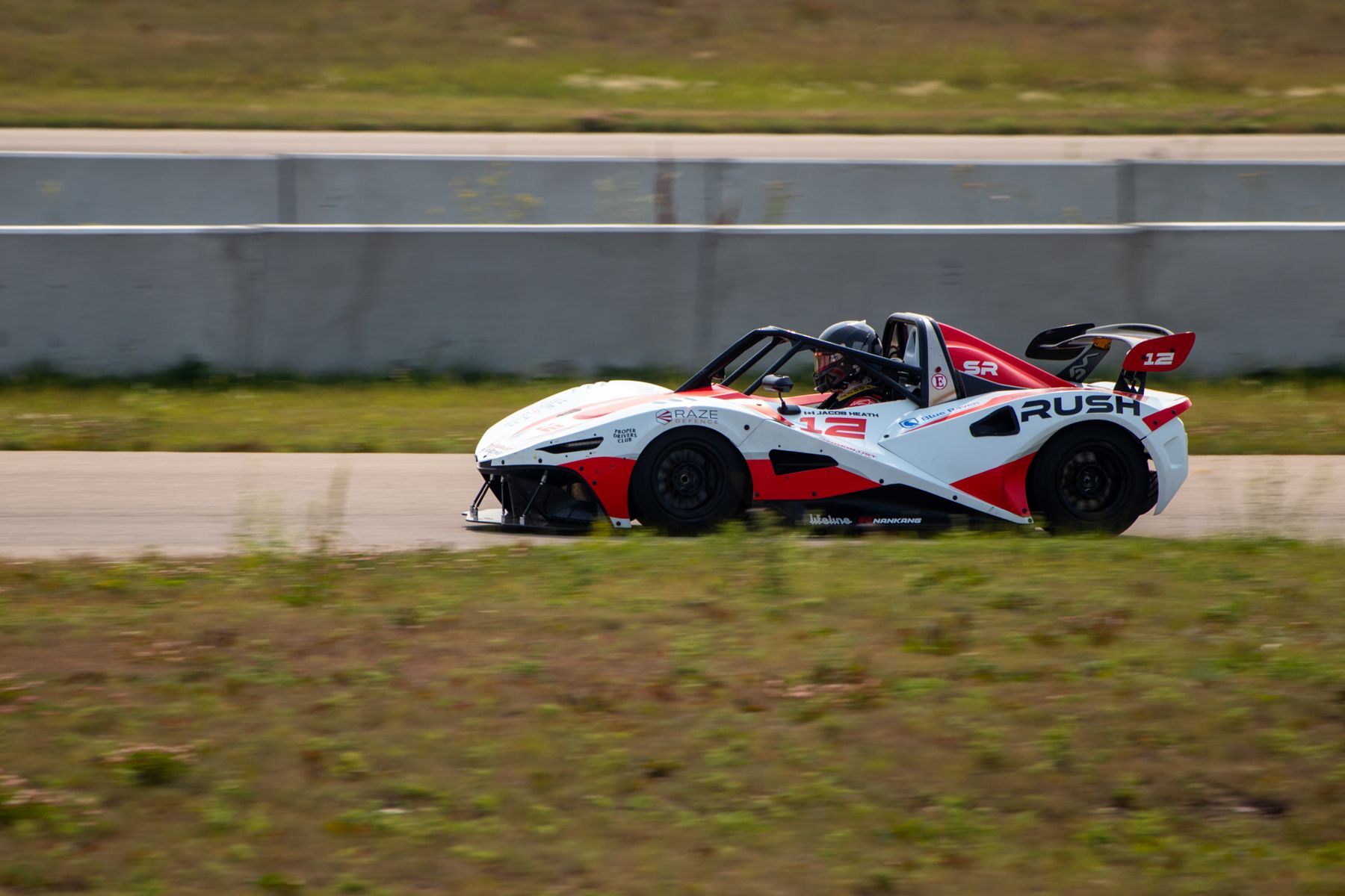 The #12 RUSH SR at speed